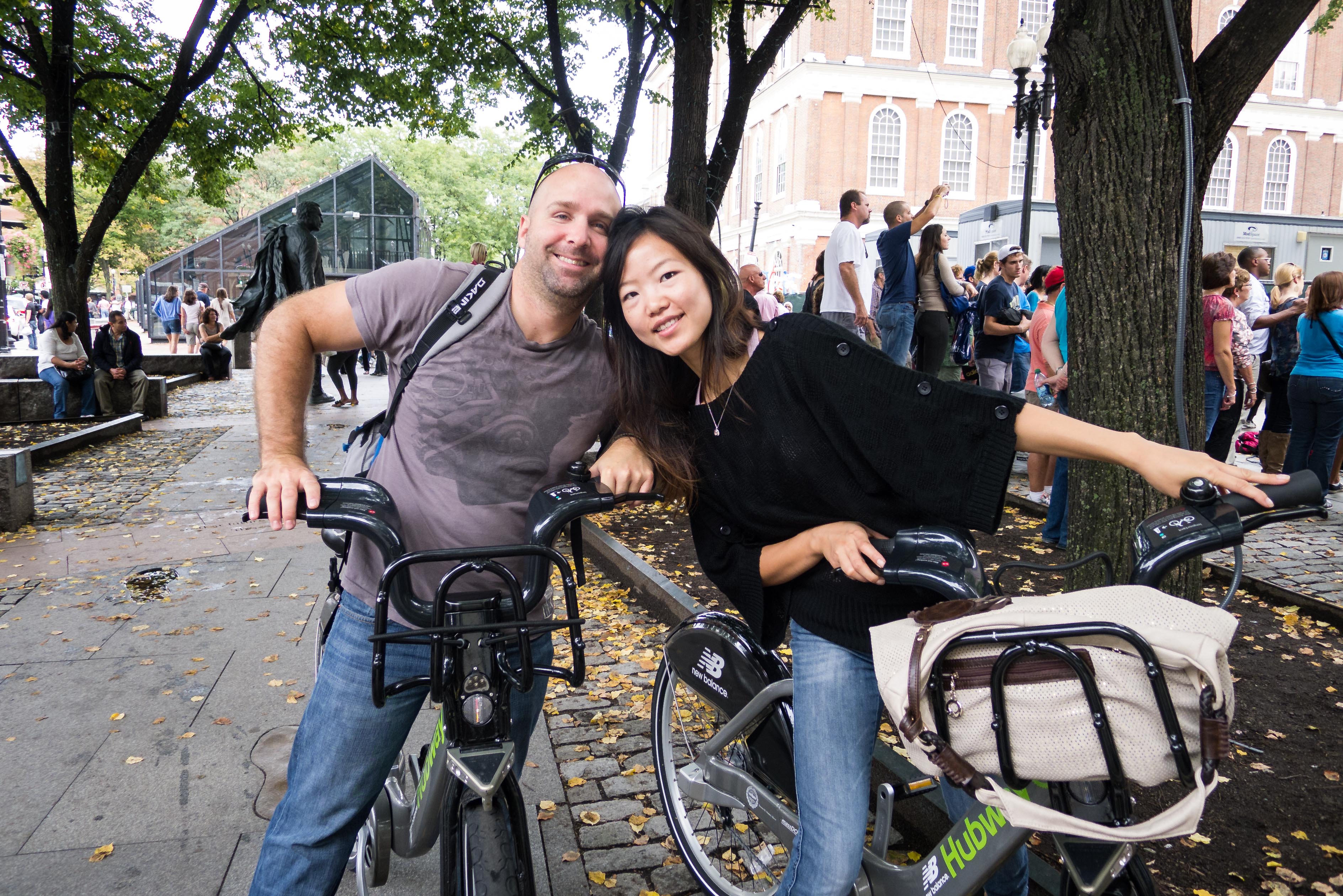 Jeremy Jacobson and Winnie Stay biking in Boston