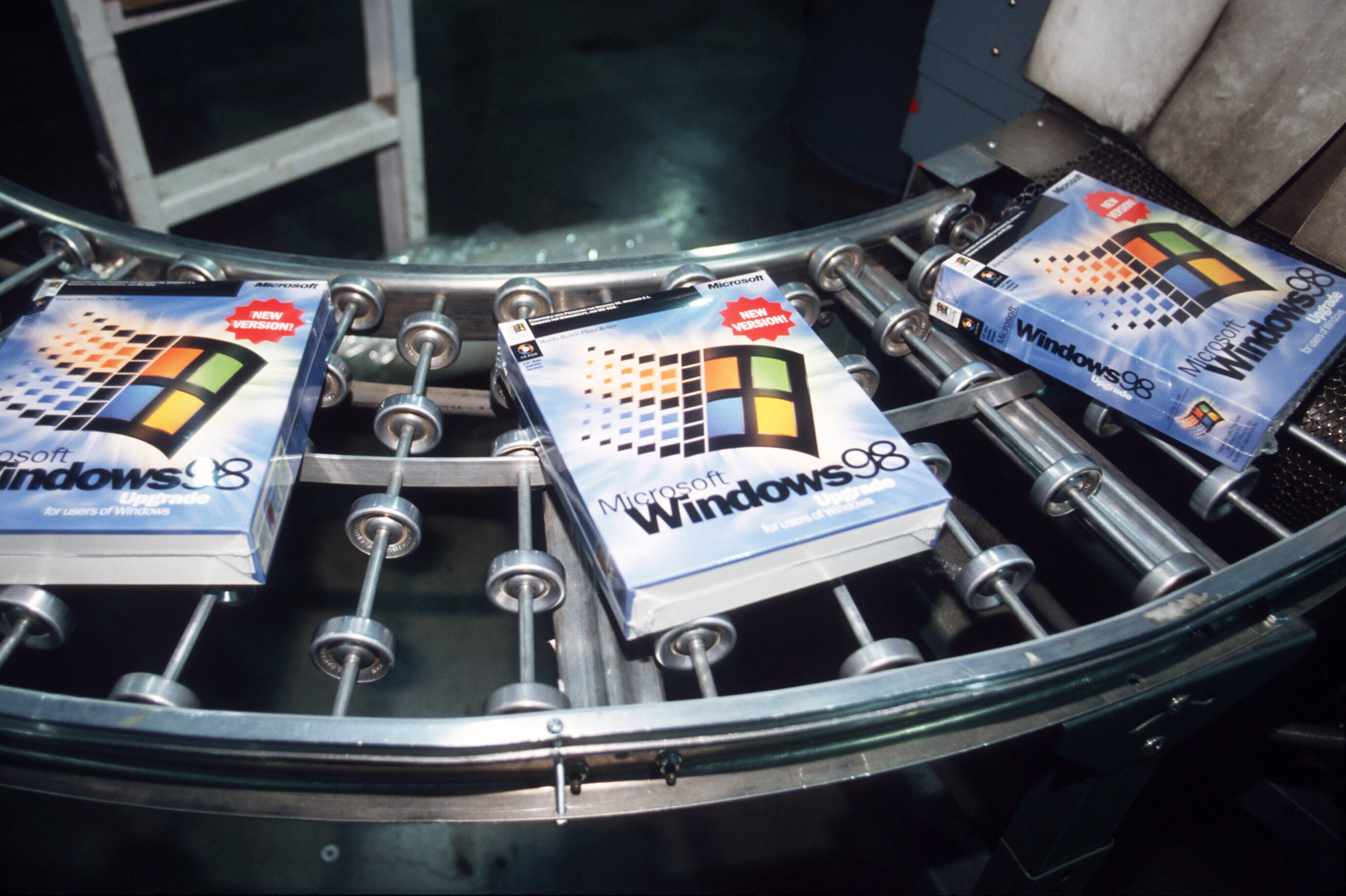 Windows 98 software packages sit on an assembly line June 24, 1998 in Bothell, WA.