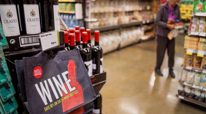 A bag for wine is displayed for sale as a customer shops at a Whole Foods Market Inc. store in Oakland, California, U.S., on Wednesday, May 6, 2015.