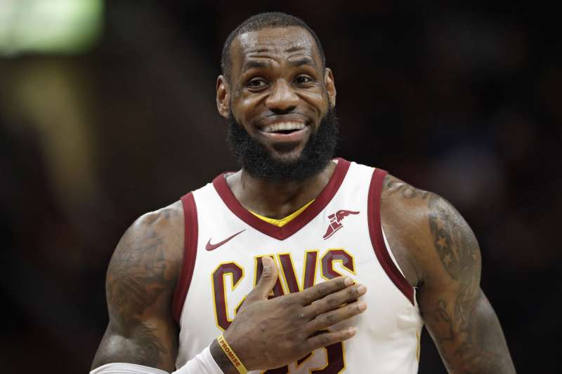 Cleveland Cavaliers' LeBron James smiles in the first half of an NBA basketball game against the Detroit Pistons, in Cleveland
            Pistons Cavaliers Basketball, Cleveland, March 5, 2018.