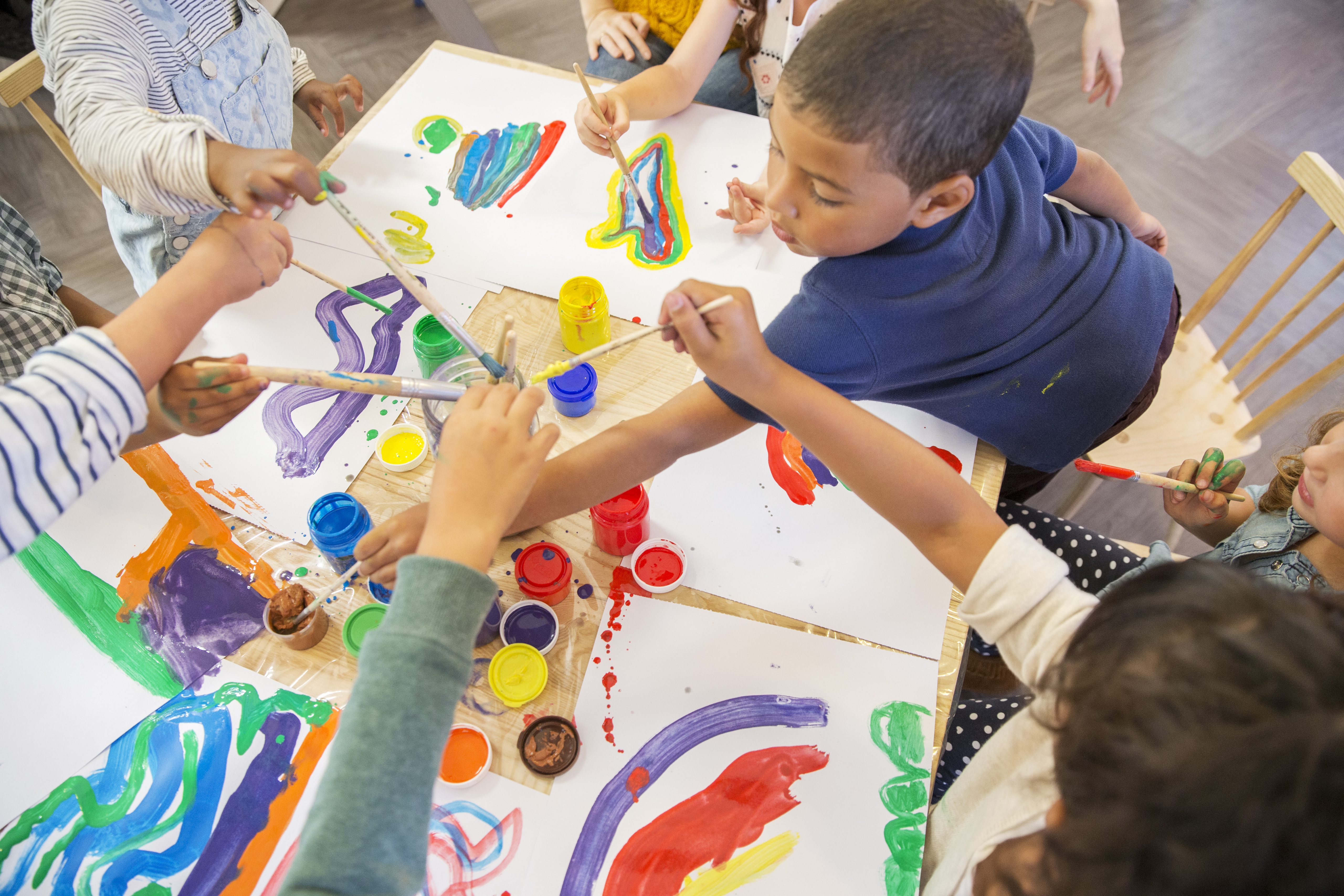 Children painting in class