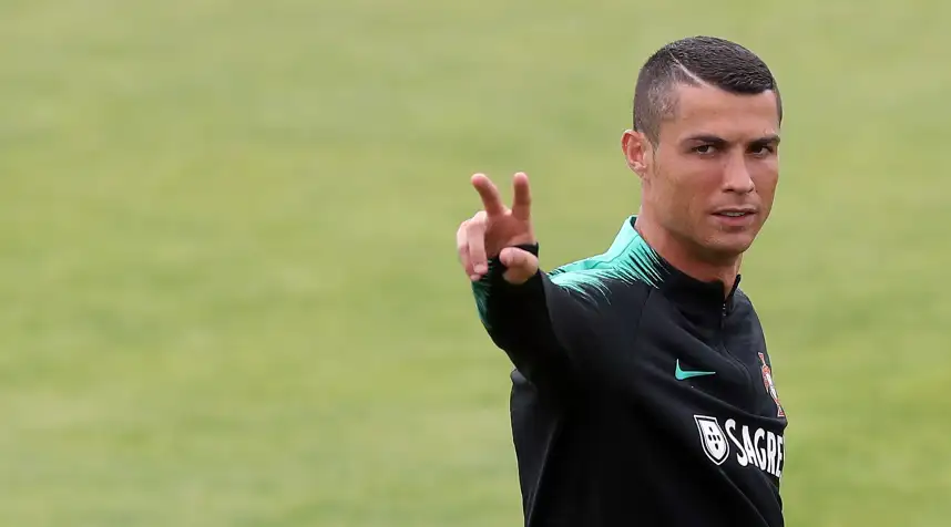Portugal's forward Cristiano Ronaldo gestures during a training session at Cidade do Futebol (Football City) training camp in Oeiras, outskirts of Lisbon, on June 4, 2018, ahead of the FIFA World Cup Russia 2018 preparation match against Algeria.