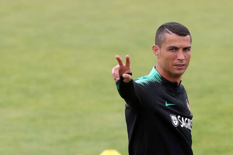 Portugal's forward Cristiano Ronaldo gestures during a training session at Cidade do Futebol (Football City) training camp in Oeiras, outskirts of Lisbon, on June 4, 2018, ahead of the FIFA World Cup Russia 2018 preparation match against Algeria.