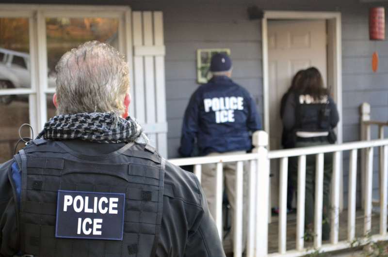 Provided U.S. Immigration and Customs Enforcement, ICE agents at a home in Atlanta, during a targeted enforcement operation aimed at immigration fugitives, re-entrants and at-large criminal aliens, February 9, 2017.