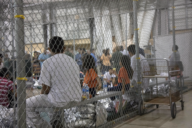 U.S. Border Patrol agents conduct intake of illegal border crossers at the Central Processing Center on June 17, 2018 in McAllen, Texas