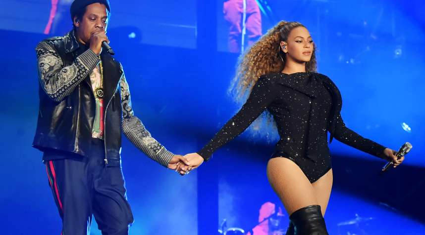 ay-Z and Beyonce Knowles perform on stage during the  On the Run II  tour opener at Principality Stadium on June 6, 2018 in Cardiff, Wales.