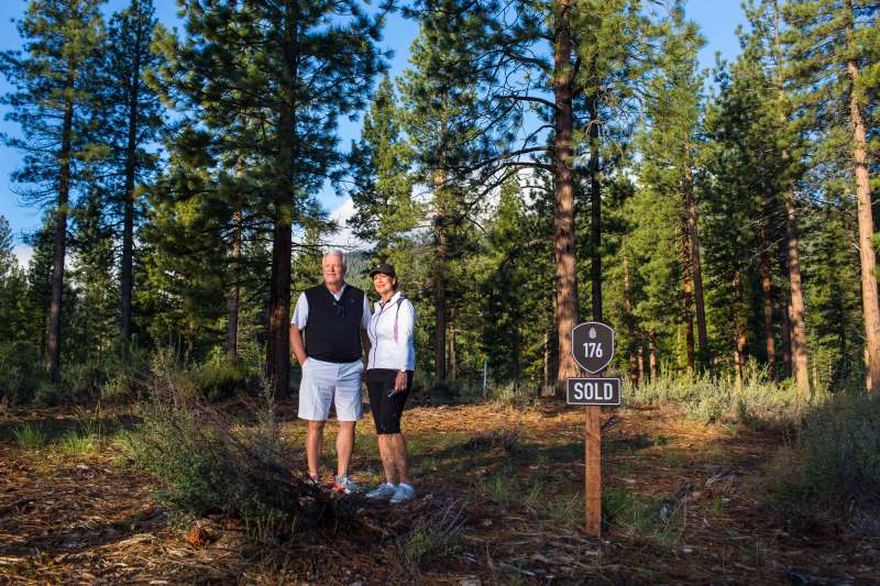 Clark and Ellen Hurst, of Bakersfield, Calif., stand on the the lot where they plan to build their retirement home in Clear Creek Tahoe, near Carson City, Nevada.