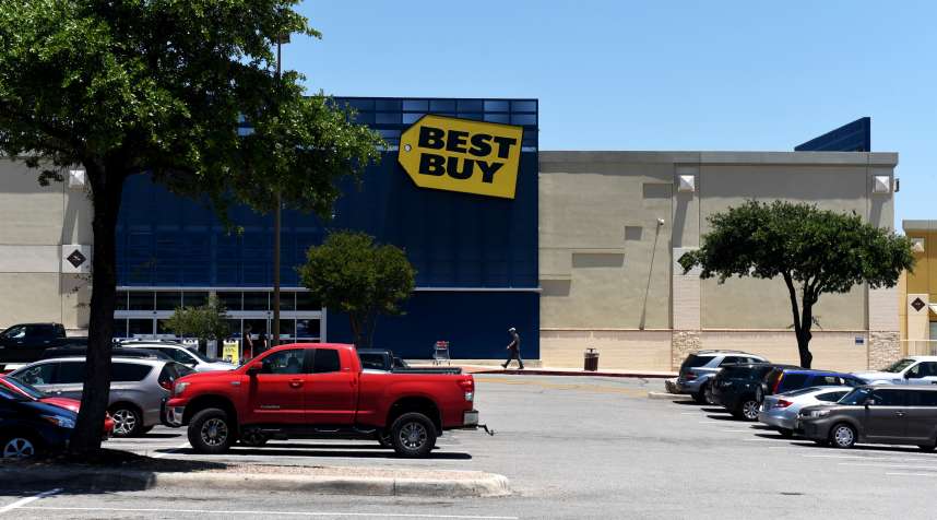 Vehicles sit parked outside Best Buy Co. store in San Antonio, Texas, U.S., on Thursday, May 17, 2018.
