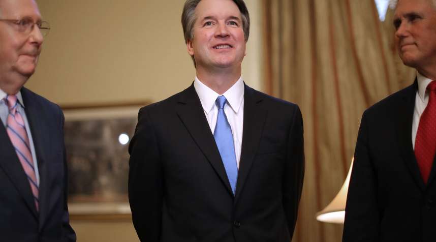(L-R) Senate Majority Leader Mitch McConnell (R-KY), Judge Brett Kavanaugh and Vice President Mike Pence pose for photographs before a meeting in McConnell's office in the U.S. Capitol July 10, 2018 in Washington, DC. U.S. President Donald Trump nominated Kavanaugh to succeed retiring Supreme Court Associate Justice Anthony Kennedy.
