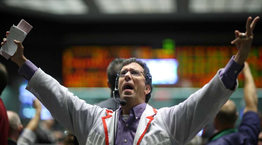 Trader Jeff Feldman works in the S&amp;P 500 pit at the Chicago Mercantile Exchange, September 15, 2008. Global markets plummeted on Monday after investment bank Lehman Brothers filed for bankruptcy protection, rival Merrill Lynch agreed to be taken over and the Federal Reserve threw a life line to the battered financial industry.