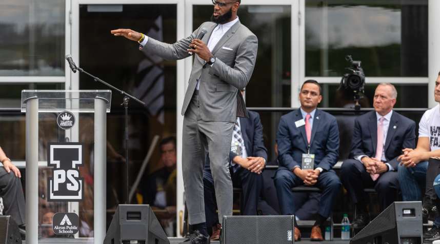 LeBron James addresses the crowd during the opening ceremonies of the I Promise School on July 30, 2018 in Akron, Ohio. The School is a partnership between the LeBron James Family foundation and the Akron Public School and is designed to serve Akron's most challenged students.