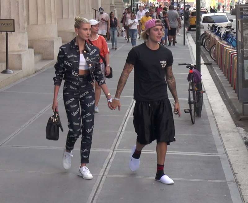 Hailey Baldwin and Justin Bieber walking