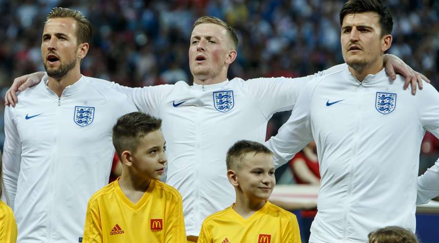 Harry Kane, Jordan Pickford, and Harry Maguire of England, prior to their semifinal World Cup 2018 match in Russia.