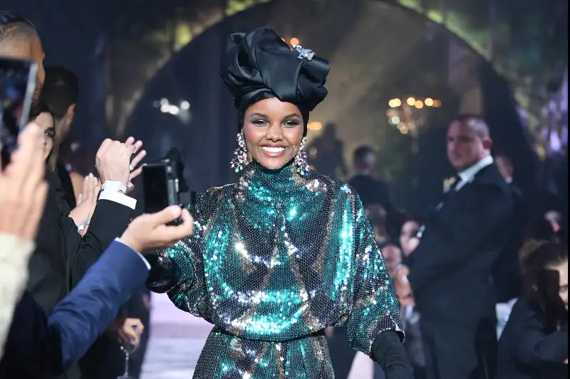 Halima Aden wearing Marc Jacobs walks the runway at the amfAR Gala Cannes 2018 at Hotel du Cap-Eden-Roc on May 17, 2018 in Cap d'Antibes, France.