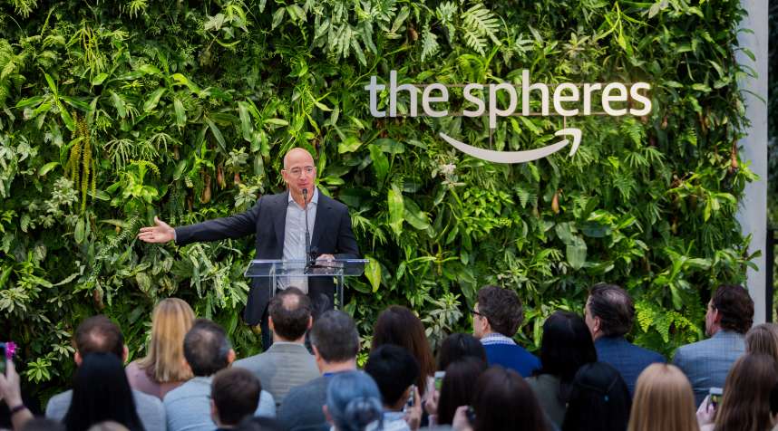 Jeff Bezos, founder and chief executive officer of Amazon.com Inc., center, speaks during opening day ceremonies at the company's Spheres in Seattle, on Jan. 29, 2018.