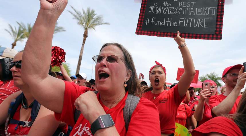 Arizona teachers chant in support of the #REDforED movement