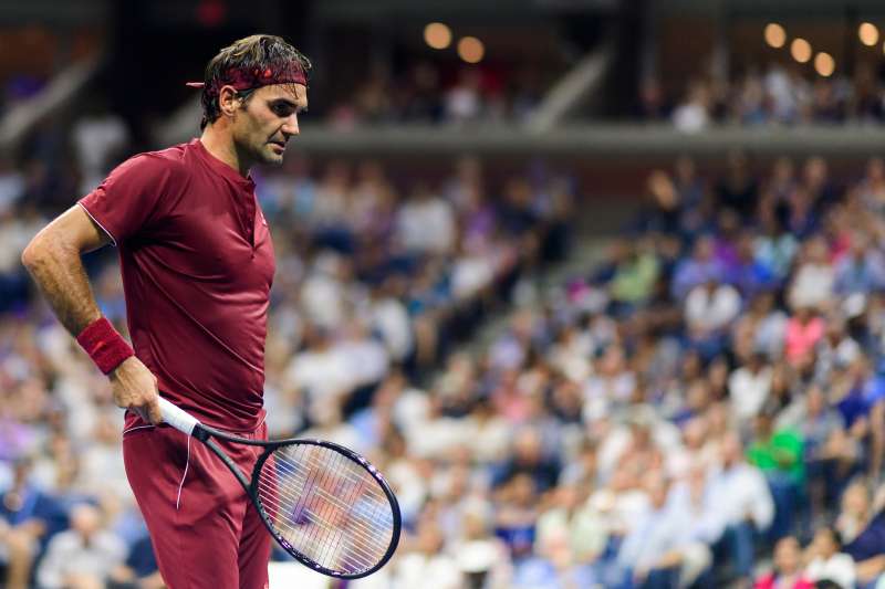 Roger Federer of Switzerland looks dejected against John Millman of Australia in the fourth round of the US Open at the USTA Billie Jean King National Tennis Centre on September 03, 2018 in New York City, United States.