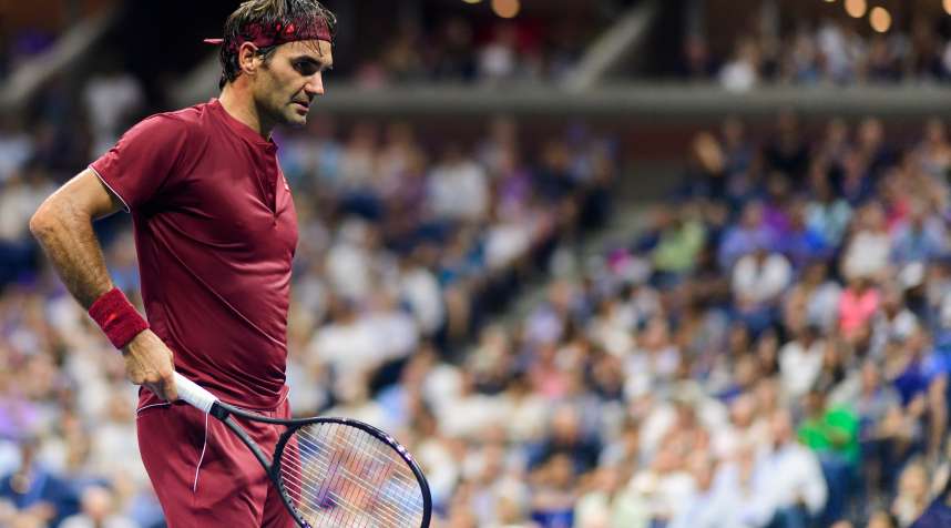Roger Federer of Switzerland looks dejected against John Millman of Australia in the fourth round of the US Open at the USTA Billie Jean King National Tennis Centre on September 03, 2018 in New York City, United States.