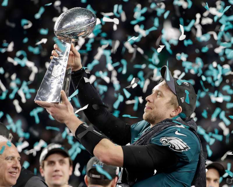 Philadelphia Eagles' Nick Foles holds up the Vince Lombardi Trophy after the NFL Super Bowl 52 football game against the New England Patriots, in Minneapolis. The Eagles won 41-33 Eagles Patriots Super Bowl Football, Minneapolis, February 4, 2018.