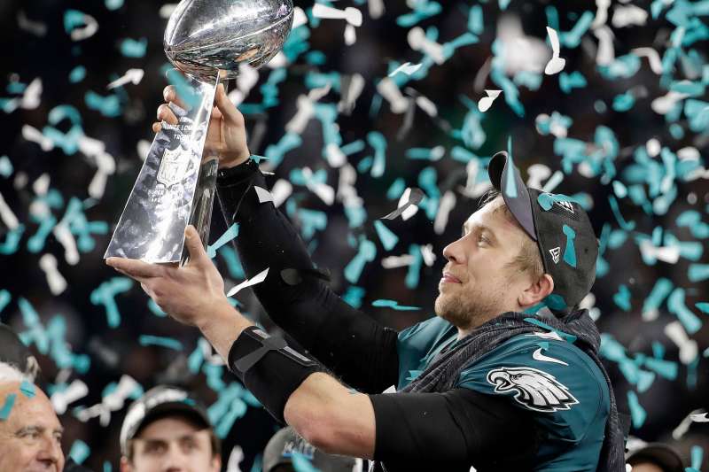 Philadelphia Eagles' Nick Foles holds up the Vince Lombardi Trophy after the NFL Super Bowl 52 football game against the New England Patriots, in Minneapolis. The Eagles won 41-33
            Eagles Patriots Super Bowl Football, Minneapolis, February 4, 2018.