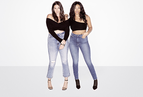 Two models pose in Good American jeans