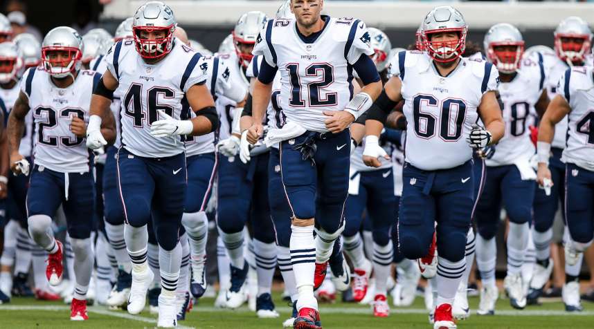 New England Patriots quarterback Tom Brady (12) leads the team out prior to the game between the New England Patriots and the Jacksonville Jaguars on September 16, 2018 at TIAA Bank Field in Jacksonville, Fl.