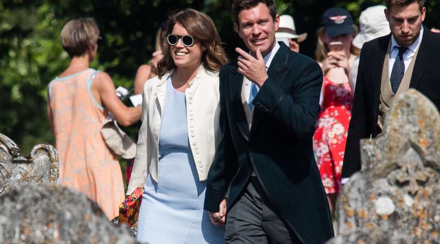 Princess Eugenie and fiance Jack Brooksbank attend the wedding of Charlie Van Straubenzee on August 4, 2018 in Frensham, United Kingdom.