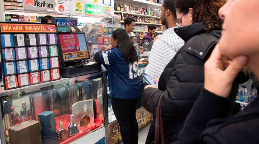 Stores have seen huge lines of customers buying Mega Millions tickets since the jackpot hit the all-time record high.