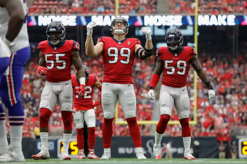 J.J. Watt #99 of the Houston Texans gets the crowd to make noise in the fourth quarter against the Buffalo Bills at NRG Stadium on October 14, 2018 in Houston, Texas.