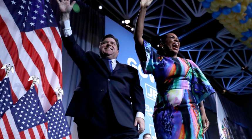 J.B. Pritzker, Juliana Stratton. Democratic gubernatorial candidate J.B. Pritzker, left, and his running mate lt. governor candidate, Juliana Stratton, wave to supporters after Pritzker defeated incumbent Gov. Bruce Rauner in Chicago
                      Election 2018 Governor Pritzker Illinois, Chicago, November 6, 2018.