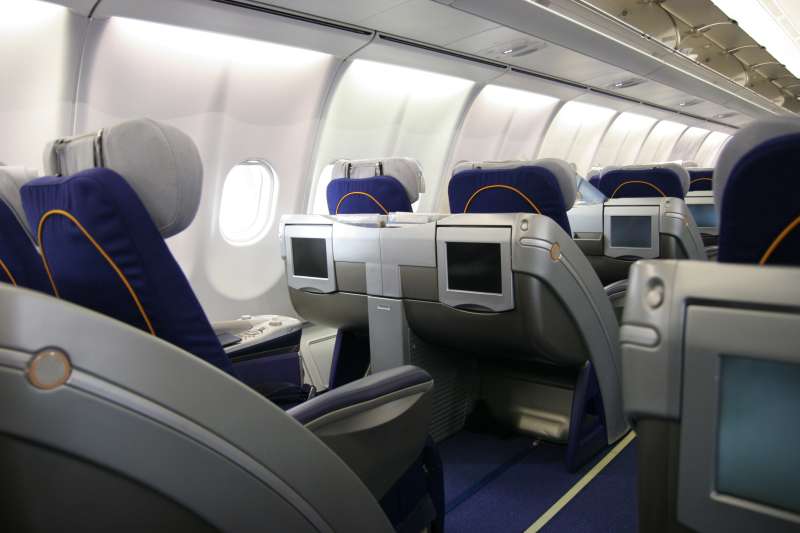 Business class airliner seat with multimedia monitor
