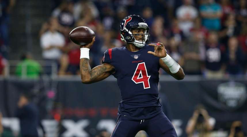 Deshaun Watson of the Houston Texans sets up to pass against the Miami Dolphins at NRG Stadium on October 25, 2018 in Houston, Texas.