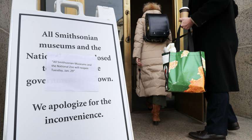 Workers return to work at the Smithsonian Museum of Natural History following the end of the longest-ever partial federal government shutdown.