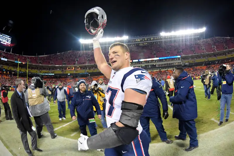 New England Patriots tight end Rob Gronkowski (87) celebrates the win over the Kansas City Chiefs during overtime in the AFC Championship game at Arrowhead Stadium.