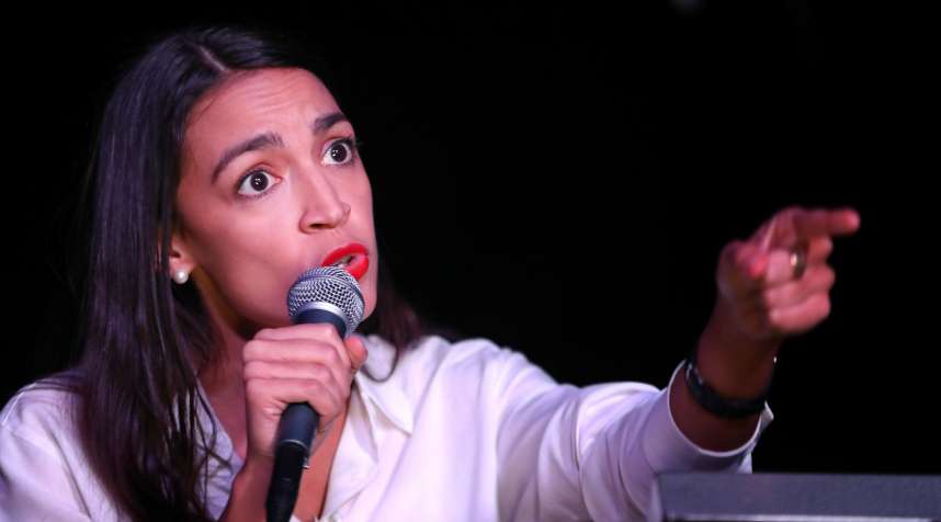 Alexandria Ocasio-Cortez addresses the crowd gathered at La Boom night club in Queens on November 6, 2018, in New York City.