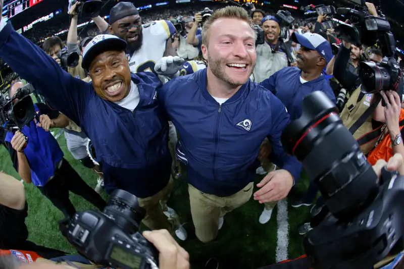 The youngest Super Bowl head coach Sean McVay of the Los Angeles Rams  shakes hands with the oldest head Coach Bill Belichick - Gold Medal  Impressions