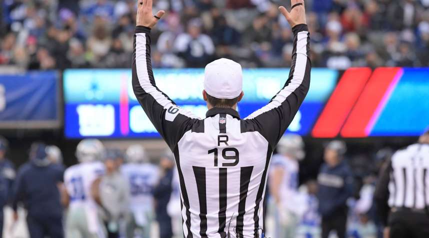 A referee gestures during the second half of an NFL football game between the New York Giants and the Dallas Cowboys, in East Rutherford, N.J
                      Cowboys Giants Football, East Rutherford, December 30, 2018.