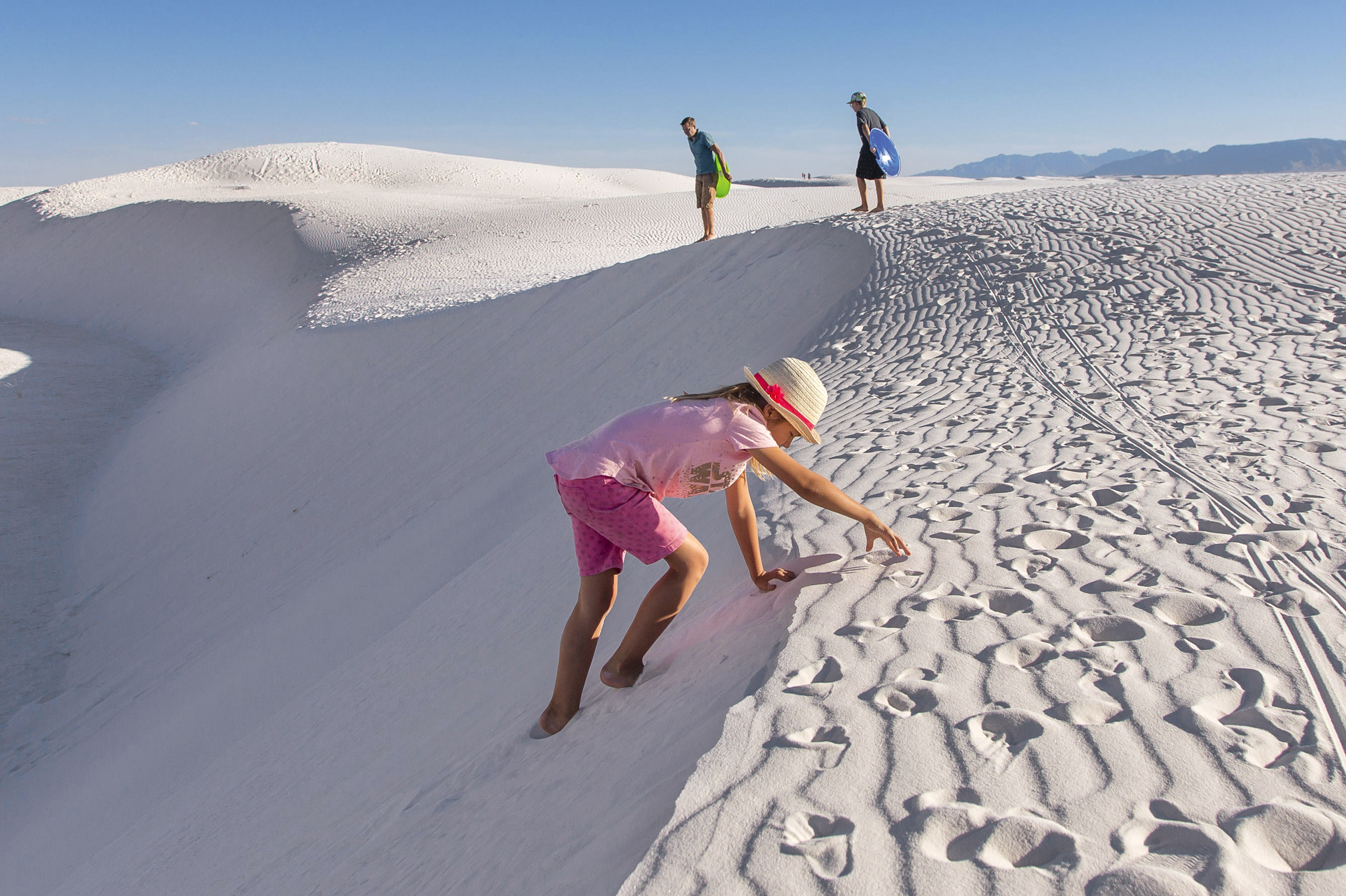 Visitors flock to the dramatic White Sands National Monument near Las Cruces.