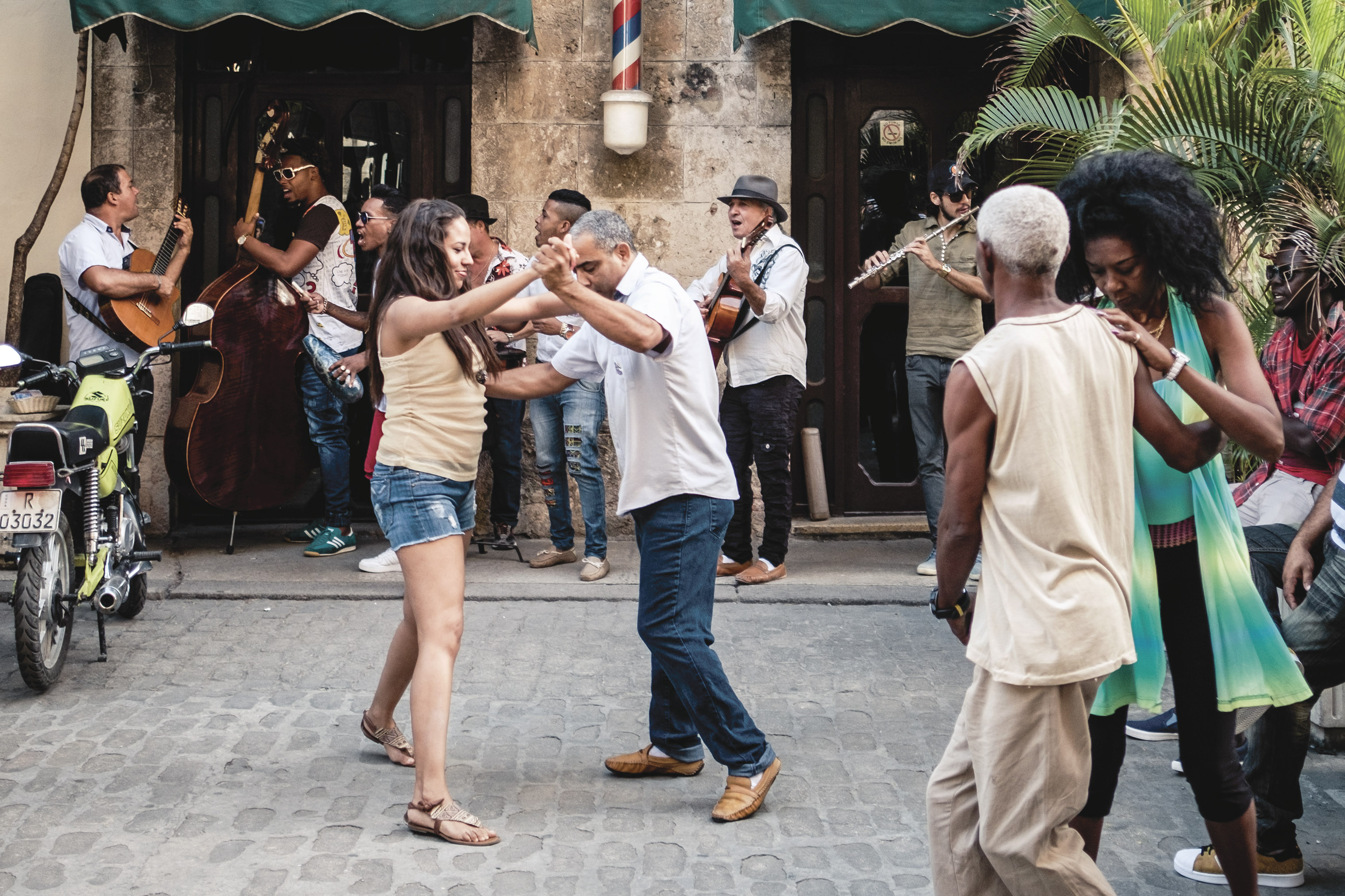 People dance in the streets of Old Havana.