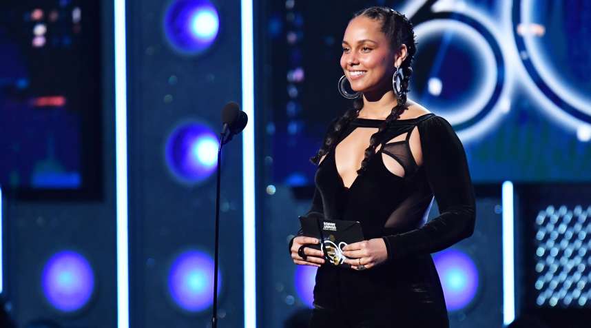 Recording artist Alicia Keys speaks onstage during the GRAMMY Awards in 2018. This year, Alicia Keys will  host the event, known as  Music's Biggest Night.