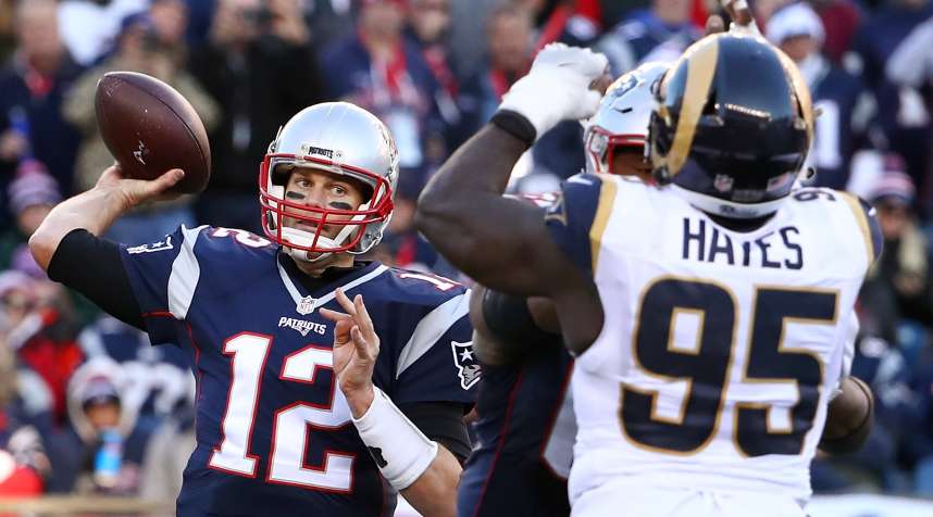 Tom Brady of the New England Patriots throws a pass against the Los Angeles Rams in a regular season game on on December 4, 2016. The Patriots won, 26-10.