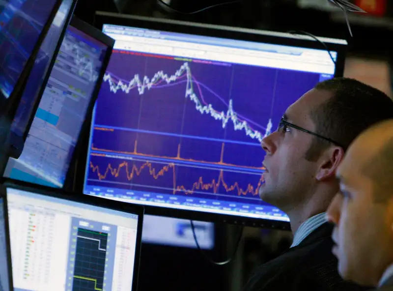 Traders work on the floor of the New York Stock Exchange March 9, 2009.