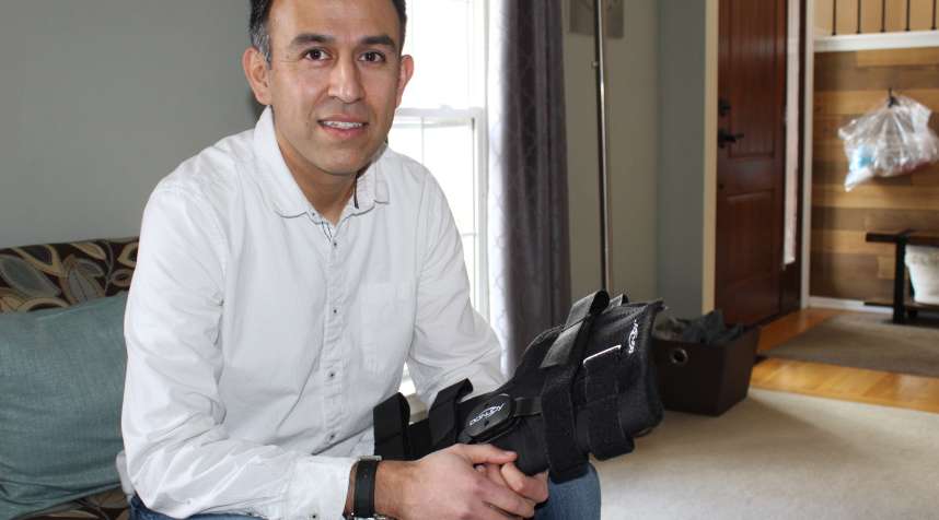 After a sports injury, Esteban Serrano owed $829.41 for a knee brace purchased with insurance through his doctor’s office. He says he found the same kind of braces selling for less than $250 online. (Paula Andalo/Kaiser Health News)