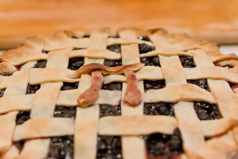 Homemade pie with pastry pi symbol decoration