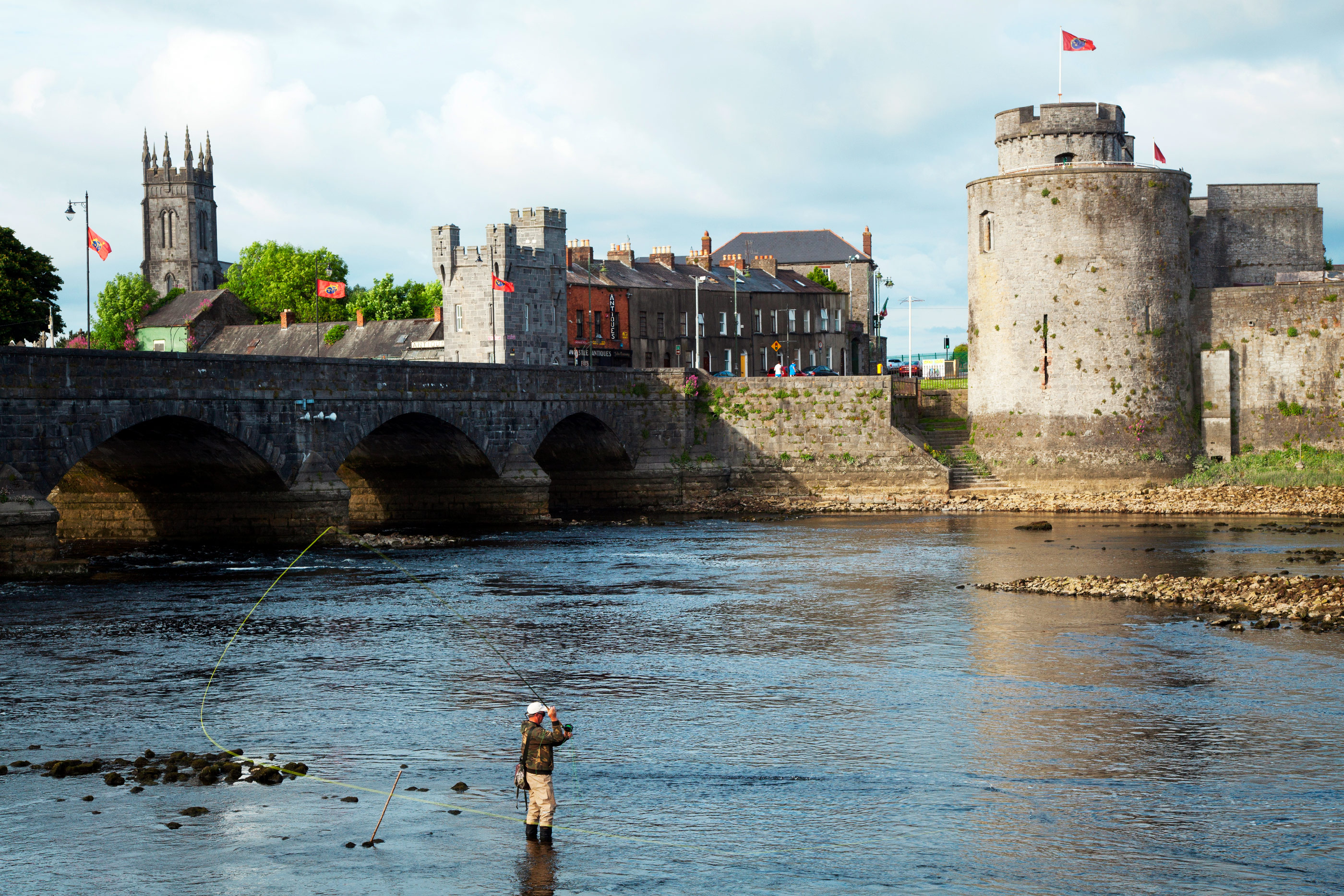 Shannon River with Thomond Bridge and King Johns Castle, Limerick, Ireland