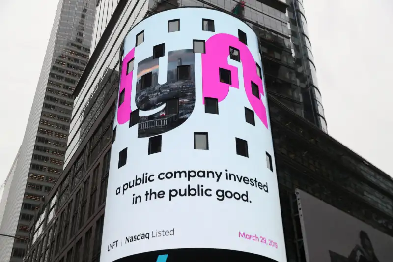 Signage for Lyft is seen displayed at the NASDAQ MarketSite in Times Square in celebration of its initial public offering (IPO) on the NASDAQ Stock Market in New York, U.S., March 29, 2019.