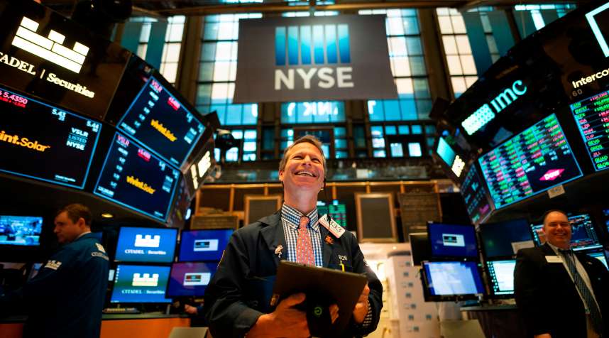 A trader works ahead of the closing bell on the floor of the New York Stock Exchange (NYSE) on April 12, 2019 in New York City.