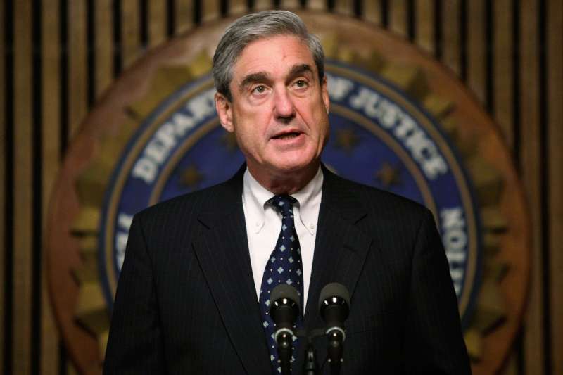 Then-FBI Director Robert Mueller speaks during a news conference at the FBI headquarters on June 25, 2008.