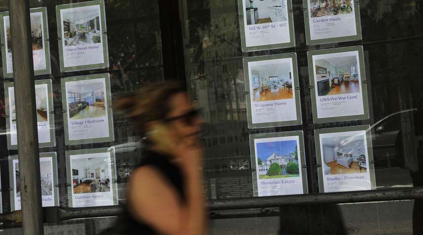 Luxury apartments are advertised in a realtor's window on the West Side of Manhattan on July 24, 2018 in New York City.