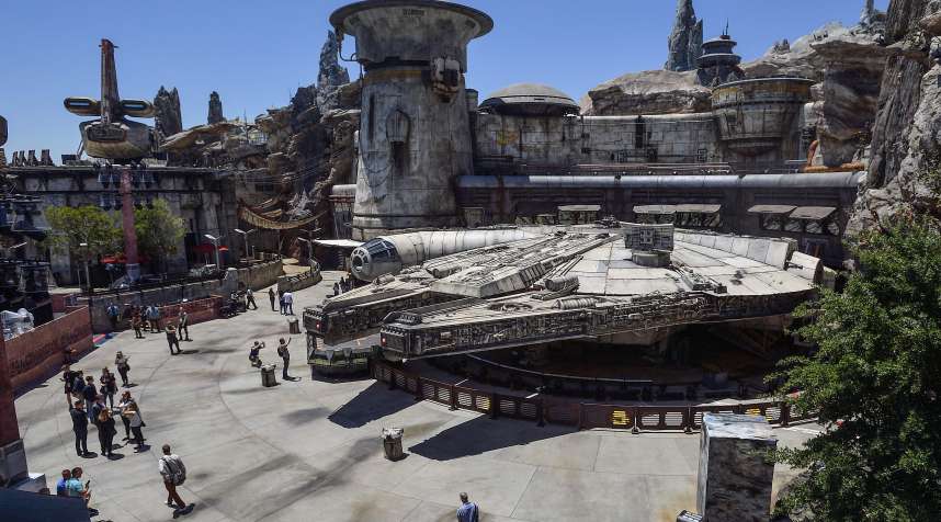 The Millennium Falcon sits outside the  Smugglers Run  ride at Star Wars: Galaxy's Edge at Disneyland in Anaheim, CA.